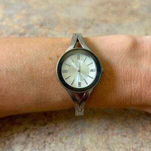 Laura Scott silver bangle like watch. Cute and easy to wear. Pre-owned